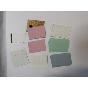 Random assortment of mini size, filofax inserts, and dividers